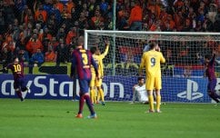 epa04503884 Lionel Messi (L) of FC Barcelona celebrates after scoring the 2-0 lead during the UEFA Champions League Group F soccer match between APOEL Nicosia and FC Barcelona in Nicosia, Cyprus, 25 November 2014. EPA/KATIA CHRISTODOULOU