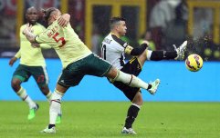 epa04509614 Ac Milan defender del Milan Philippe Mexes (L) vies for the ball with Udinese forward Antonio Di Natale during the Italian Serie A soccer match between AC Milan and Udinese Calcio at Giuseppe Meazza stadium in Milan, Italy, 30 November 2014. EPA/MATTEO BAZZI